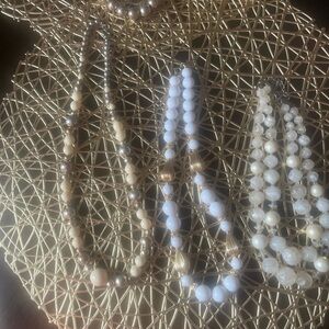 Four used costume necklaces!